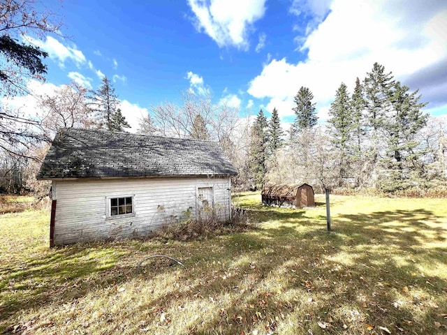 exterior space with an outbuilding