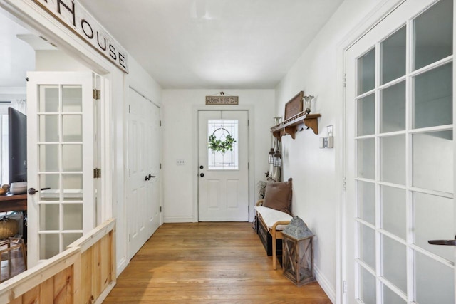 foyer entrance featuring hardwood / wood-style floors