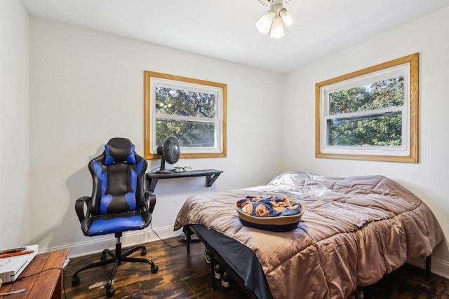 bedroom featuring dark hardwood / wood-style floors