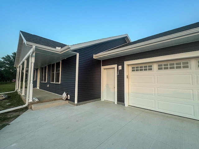 view of front of home with a garage