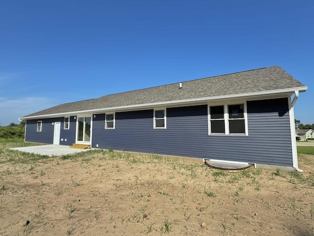 back of house featuring a patio area