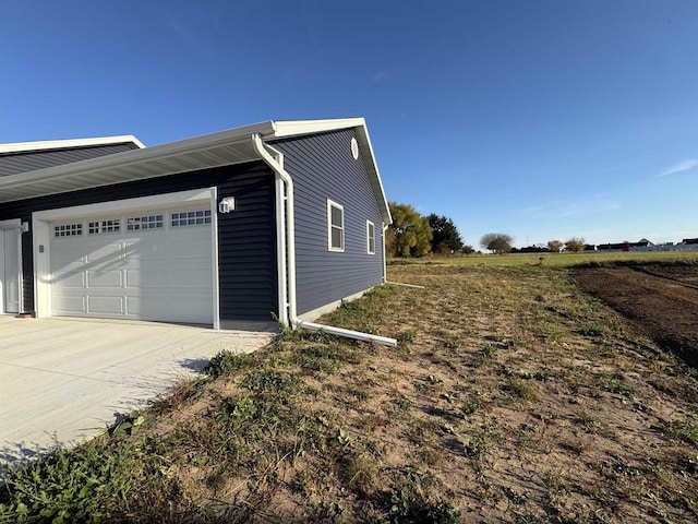 view of home's exterior with a garage