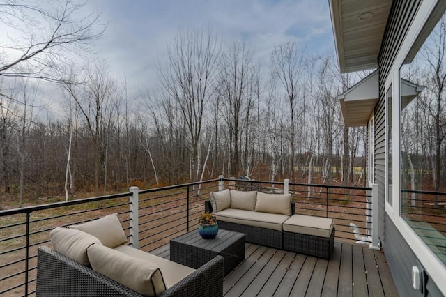 wooden terrace with outdoor lounge area