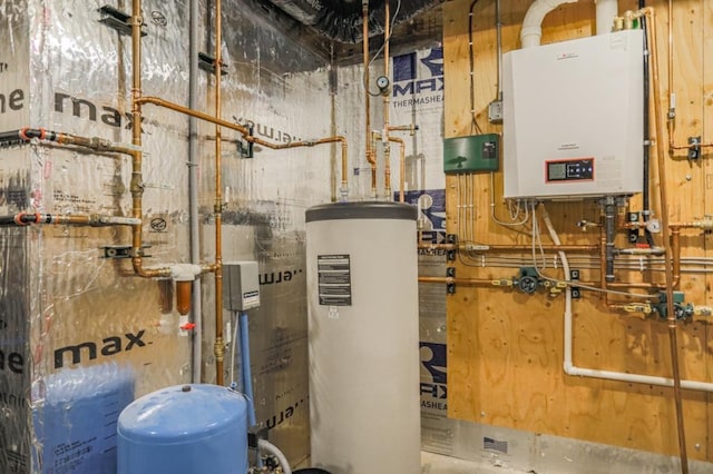 utility room with gas water heater and tankless water heater