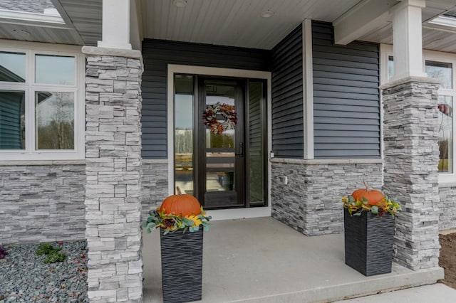 property entrance with covered porch