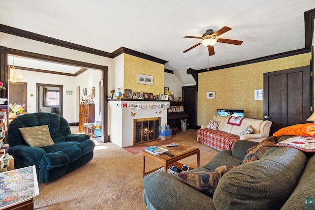 living room with crown molding, light colored carpet, and ceiling fan