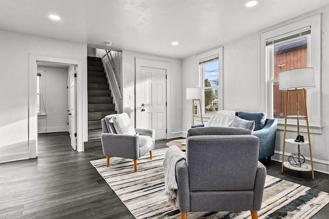 living room featuring dark hardwood / wood-style floors