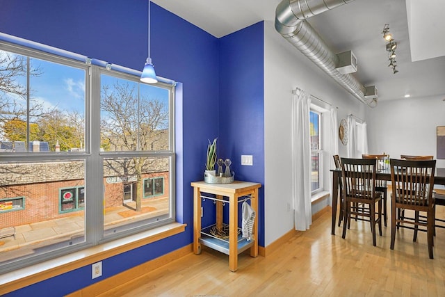 dining room featuring light hardwood / wood-style flooring