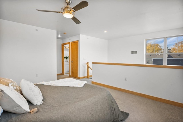 carpeted bedroom with a closet and ceiling fan