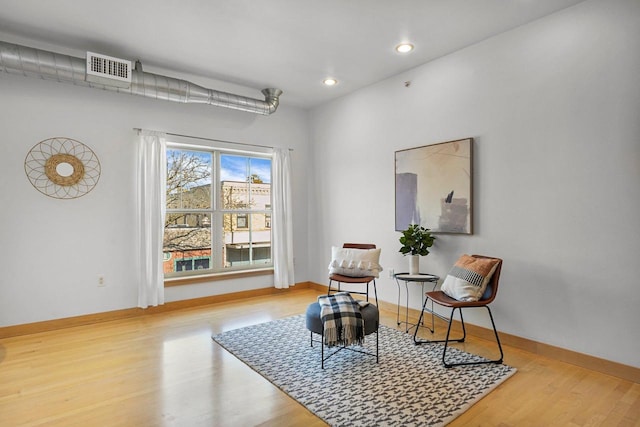 living area featuring light wood-type flooring