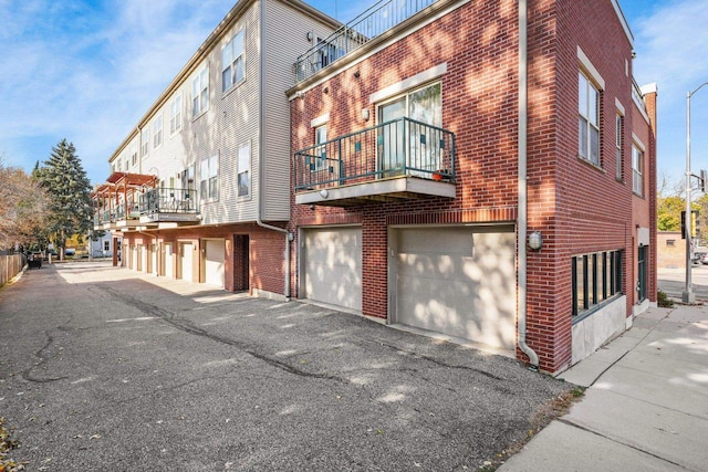 view of building exterior featuring a garage