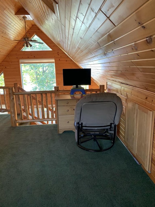 office featuring ceiling fan, carpet flooring, wooden ceiling, and wooden walls