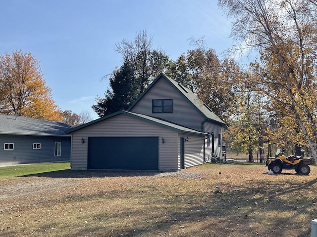 view of home's exterior with a yard