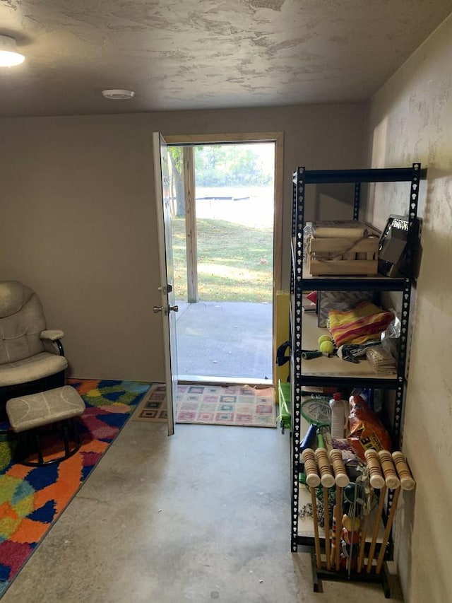 doorway with concrete flooring