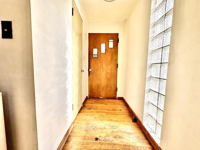 hall featuring light hardwood / wood-style flooring