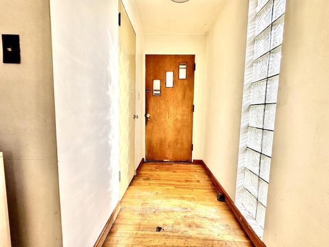 corridor featuring light wood-type flooring