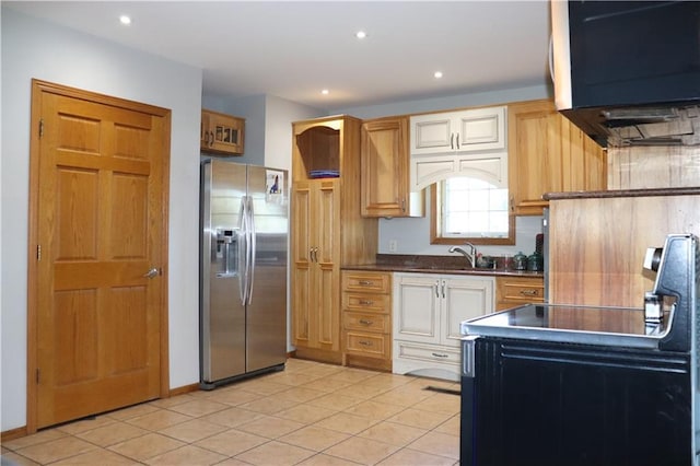 kitchen with sink, light tile patterned floors, and stainless steel fridge with ice dispenser