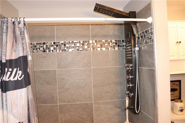 bathroom featuring walk in shower