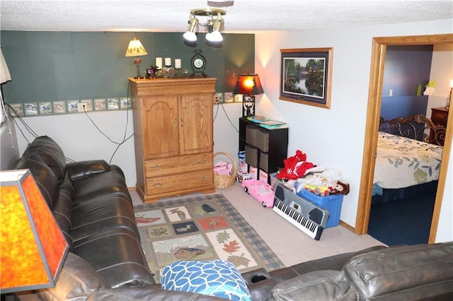 carpeted living room featuring a textured ceiling