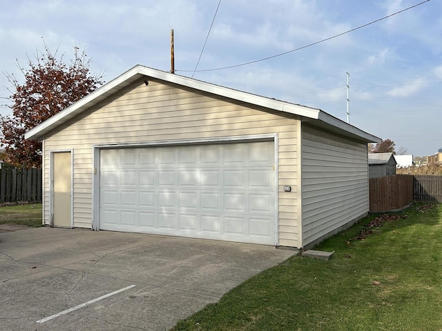 garage with a yard