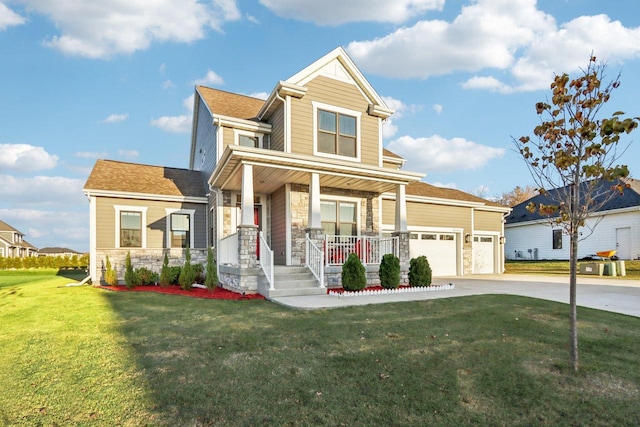 craftsman-style house featuring a porch, a front yard, and a garage