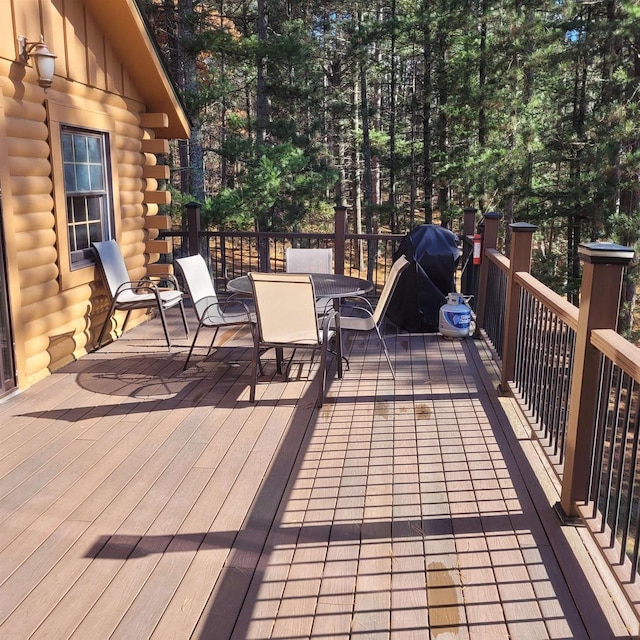 wooden terrace with grilling area