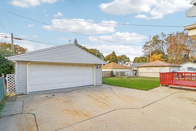 garage featuring a lawn