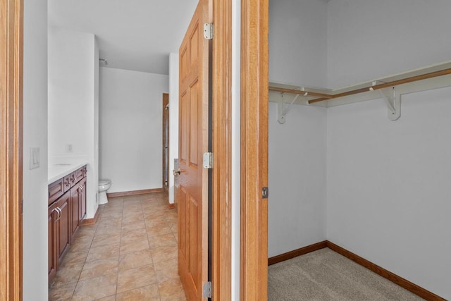 interior space with toilet and vanity