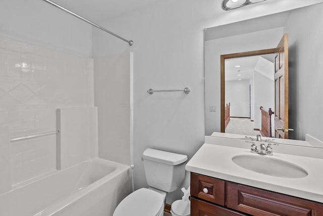 full bathroom with  shower combination, vanity, and toilet