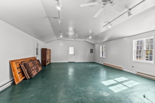 bonus room with vaulted ceiling, a baseboard heating unit, and ceiling fan