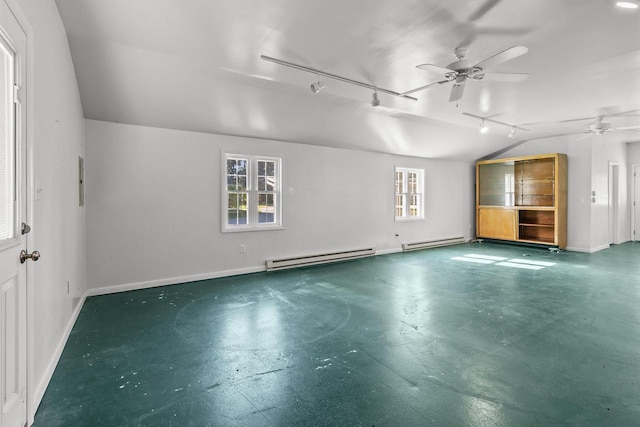 interior space with a baseboard heating unit, plenty of natural light, and ceiling fan