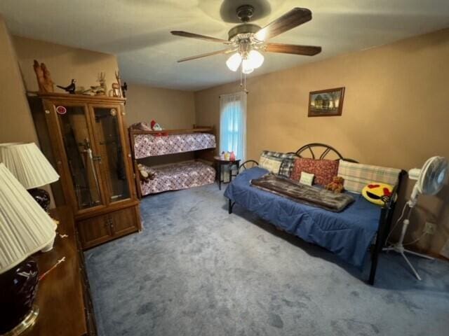 bedroom with carpet and ceiling fan