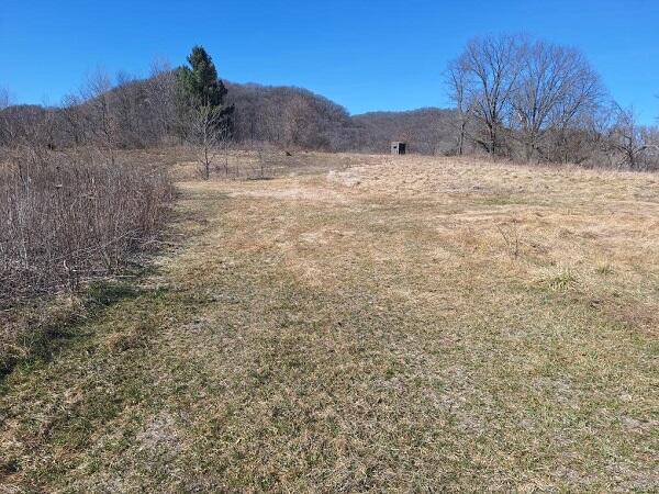 property view of mountains featuring a rural view