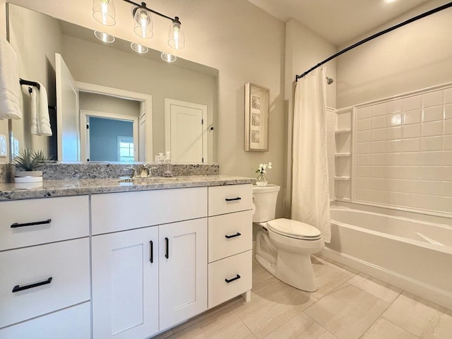 full bathroom with vanity, toilet, and shower / bath combination with curtain