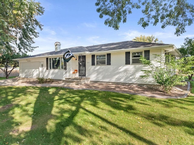 ranch-style house with a front yard and a garage