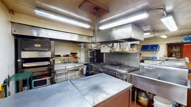 kitchen featuring appliances with stainless steel finishes and stainless steel counters