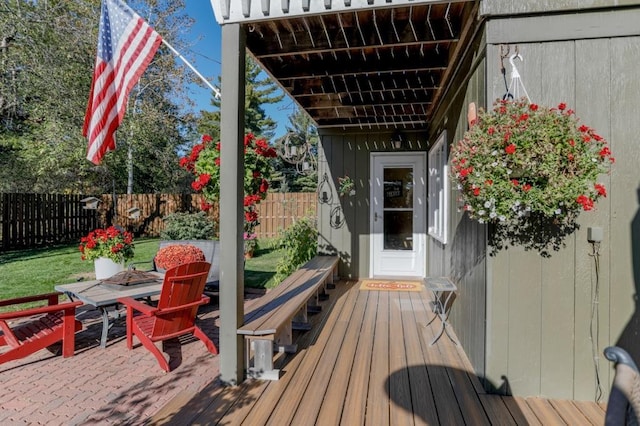 deck featuring an outdoor fire pit