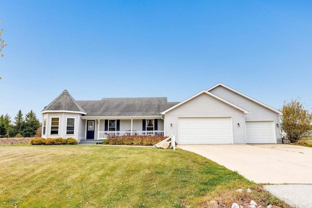 ranch-style home with a garage, a front lawn, and a porch