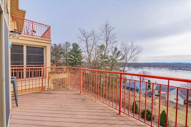 deck featuring a water view