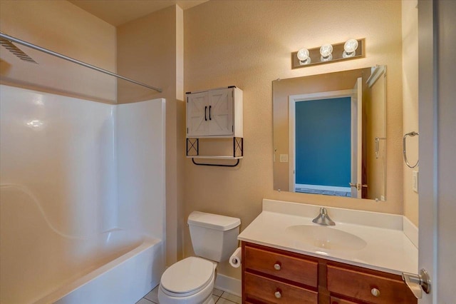 full bathroom with tile patterned flooring, bathtub / shower combination, vanity, and toilet