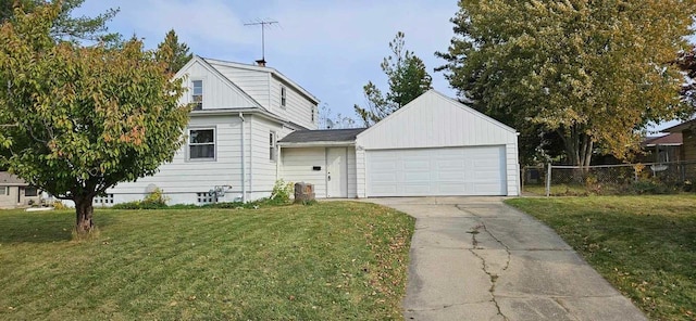 view of front of house with a front lawn and a garage