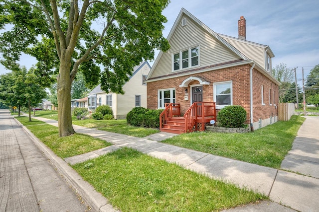 bungalow with a front yard