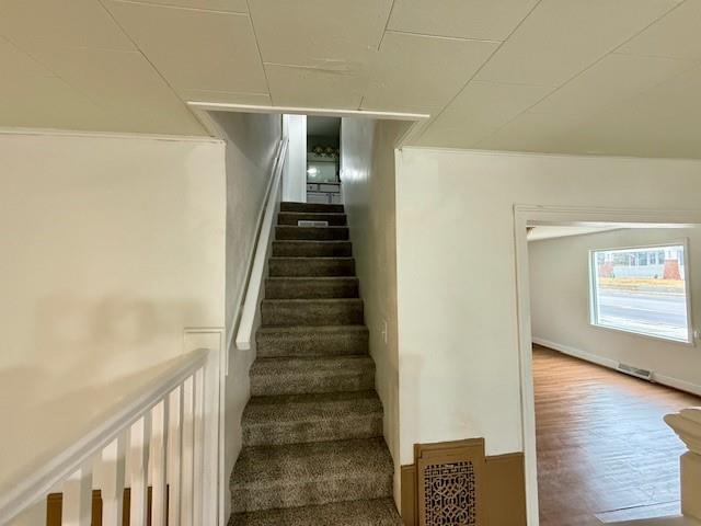 414 8th St, Baraboo, WI 53913 - staircase with visible vents and wood finished floors
