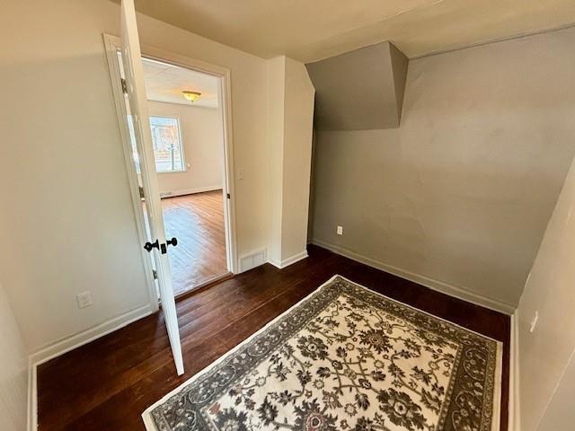 414 8th St, Baraboo, WI 53913 - unfurnished bedroom featuring baseboards and wood finished floors