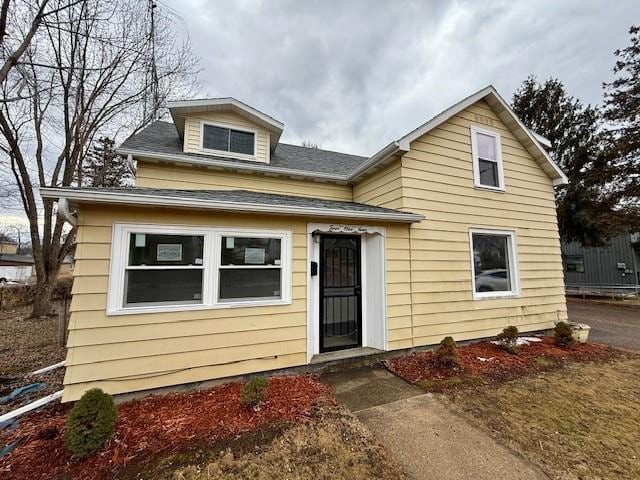 414 8th St, Baraboo, WI 53913 - bungalow-style home with a shingled roof