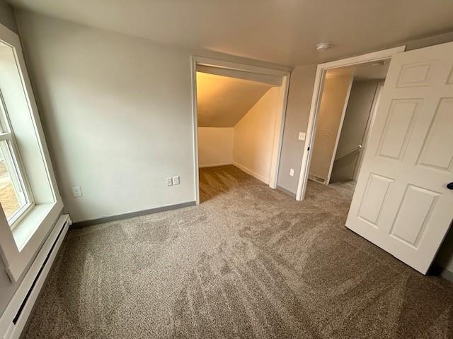 414 8th St, Baraboo, WI 53913 - interior space with carpet flooring, baseboards, and a baseboard heating unit