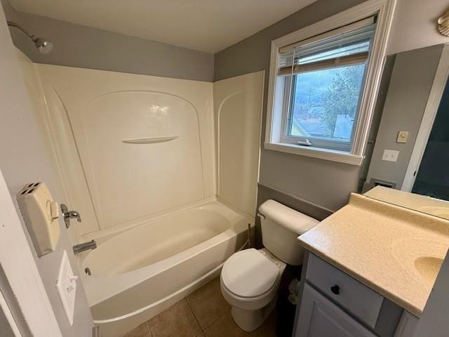 414 8th St, Baraboo, WI 53913 - full bath with vanity, shower / tub combination, tile patterned floors, and toilet
