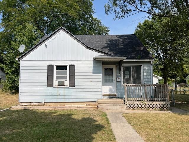 bungalow with a front lawn