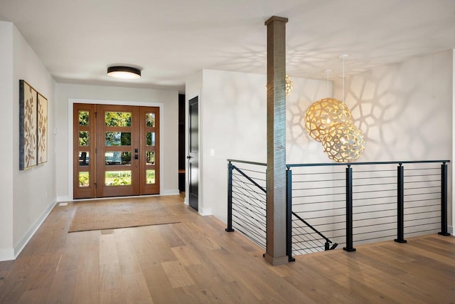 foyer entrance with hardwood / wood-style floors