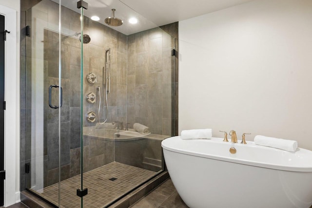 2291 Williams Point Dr, Stoughton, WI 53589 - bathroom with a soaking tub, a stall shower, and recessed lighting